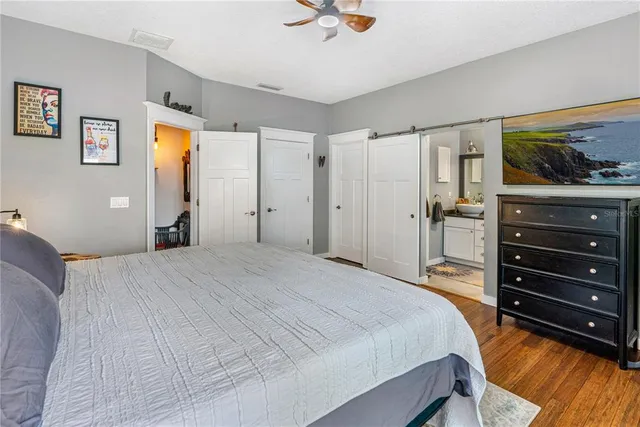 a bathroom with a toilet sink and shower