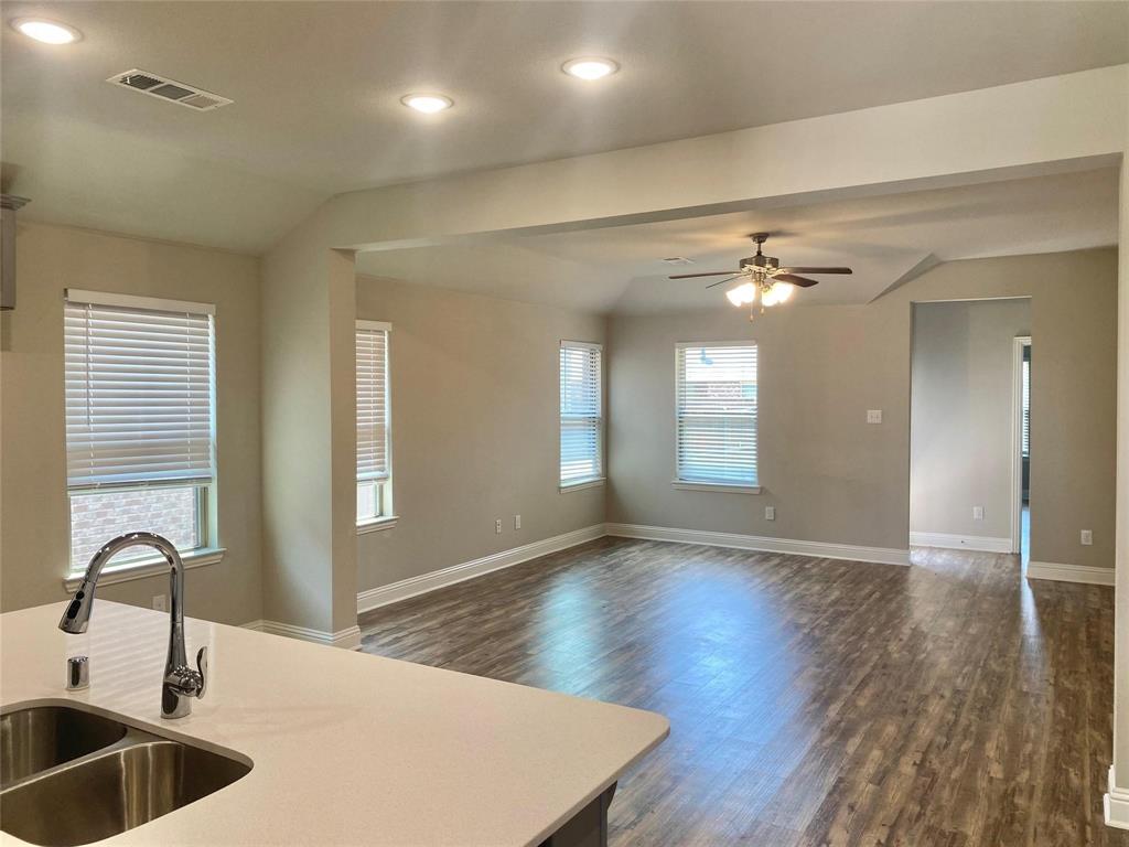 2258 Templin Avenue Forney, TX 75126 - Photo 4 of 15 a view of kitchen with sink and wooden floor