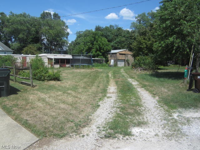 54 C348 Reno, OH 45773 - Photo 1 of 12 View of yard featuring an outdoor structure