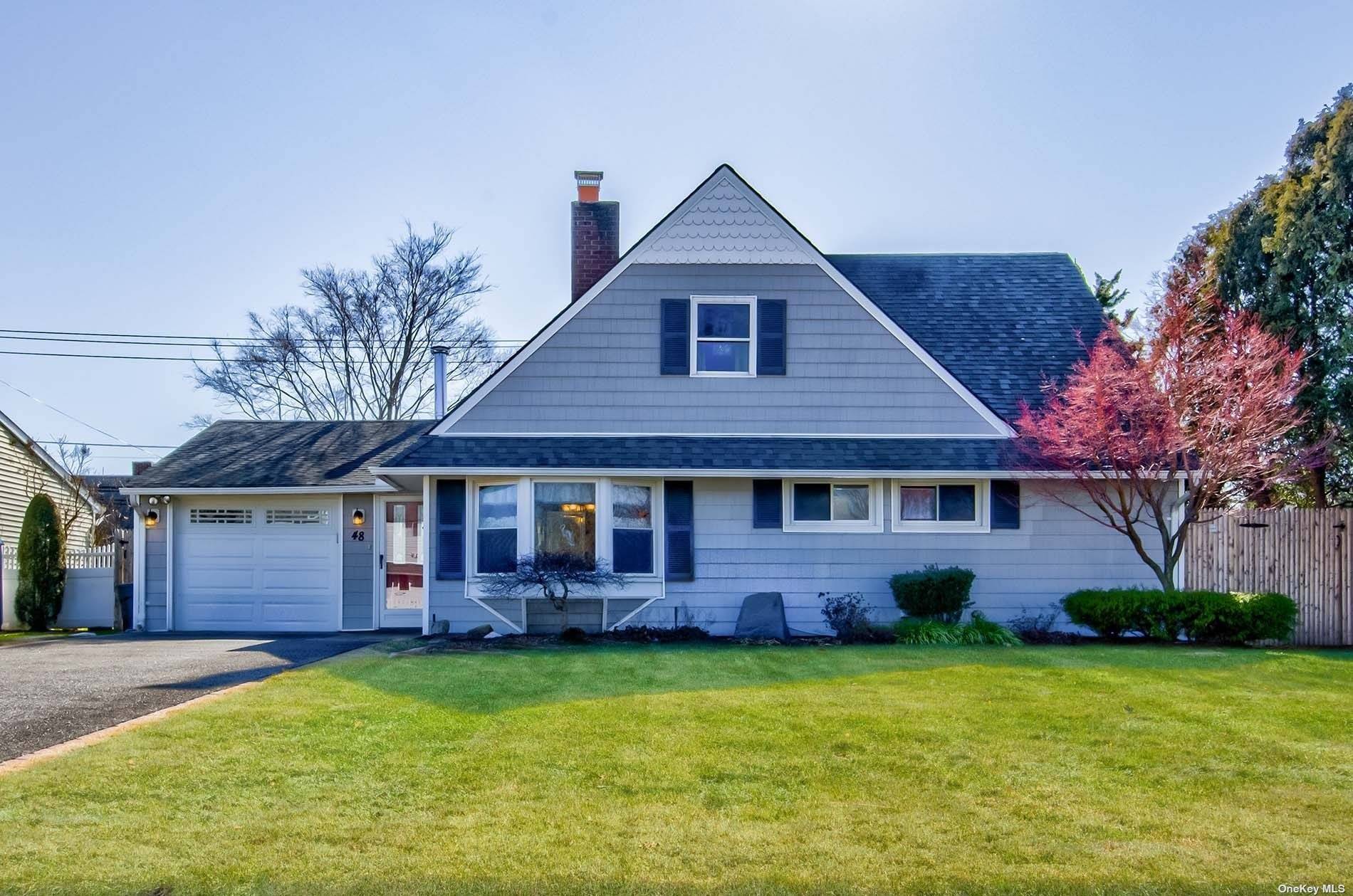 48 Spindle Road Hicksville, NY 11801 - Photo 1 of 1 a view of a house with backyard and garden