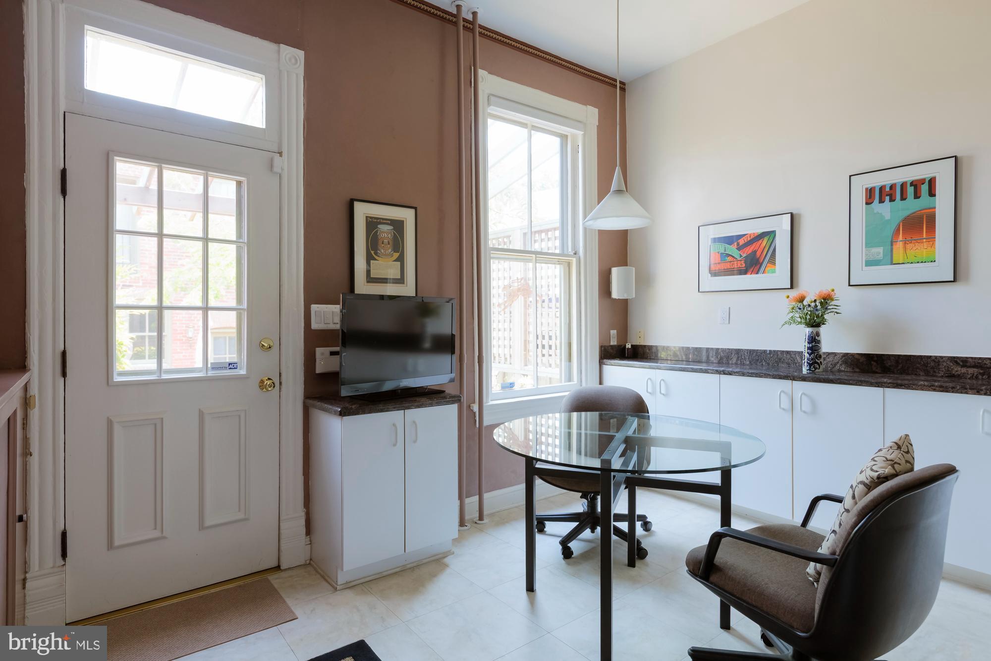 244 8th Street Southeast Washington, DC 20003 - Photo 15 of 53 a living room with furniture and a window