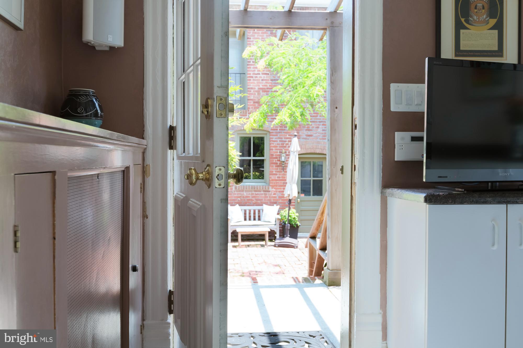 244 8th Street Southeast Washington, DC 20003 - Photo 19 of 53 a view of a living room with a flat screen tv