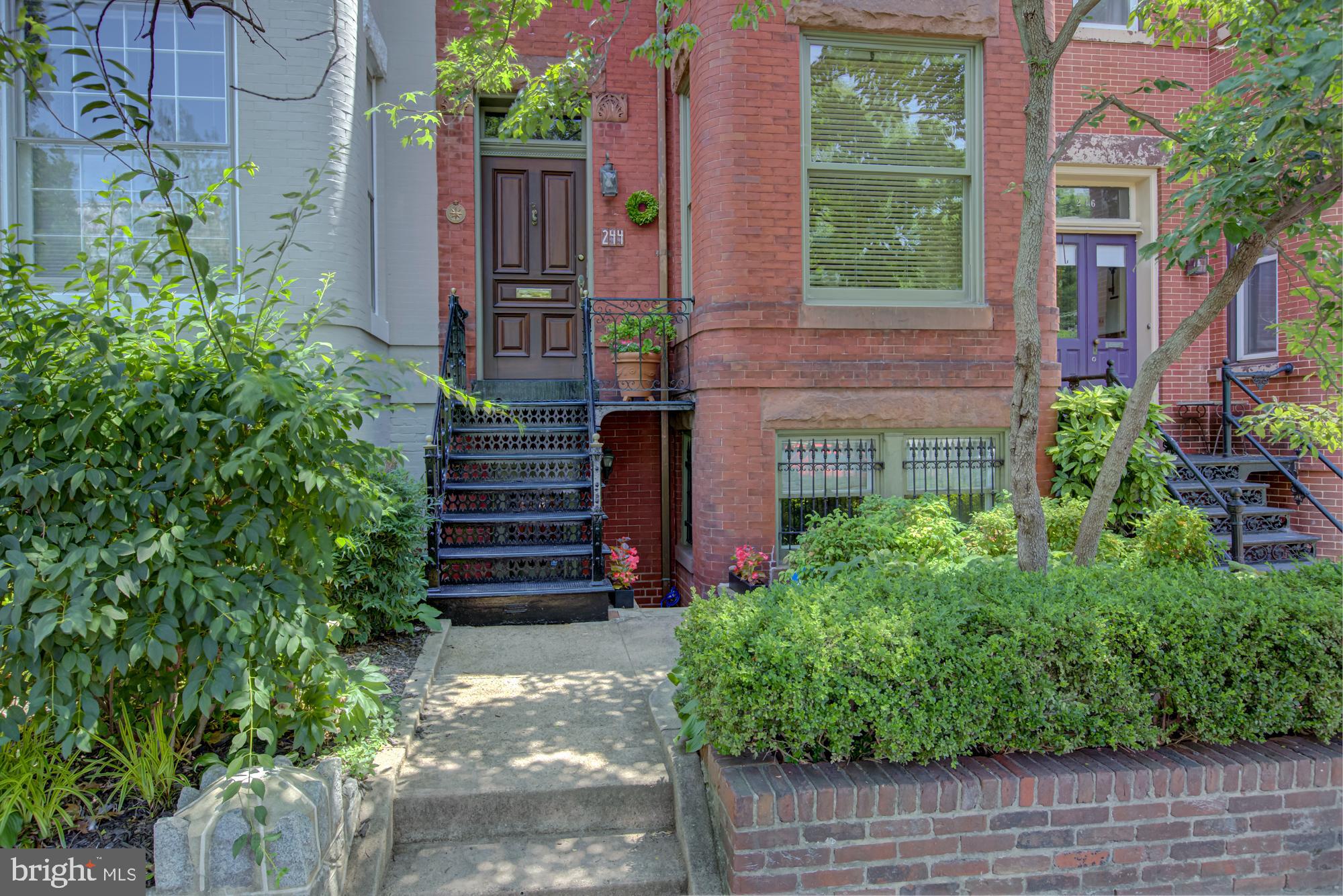 244 8th Street Southeast Washington, DC 20003 - Photo 2 of 53 a view of a house with a yard