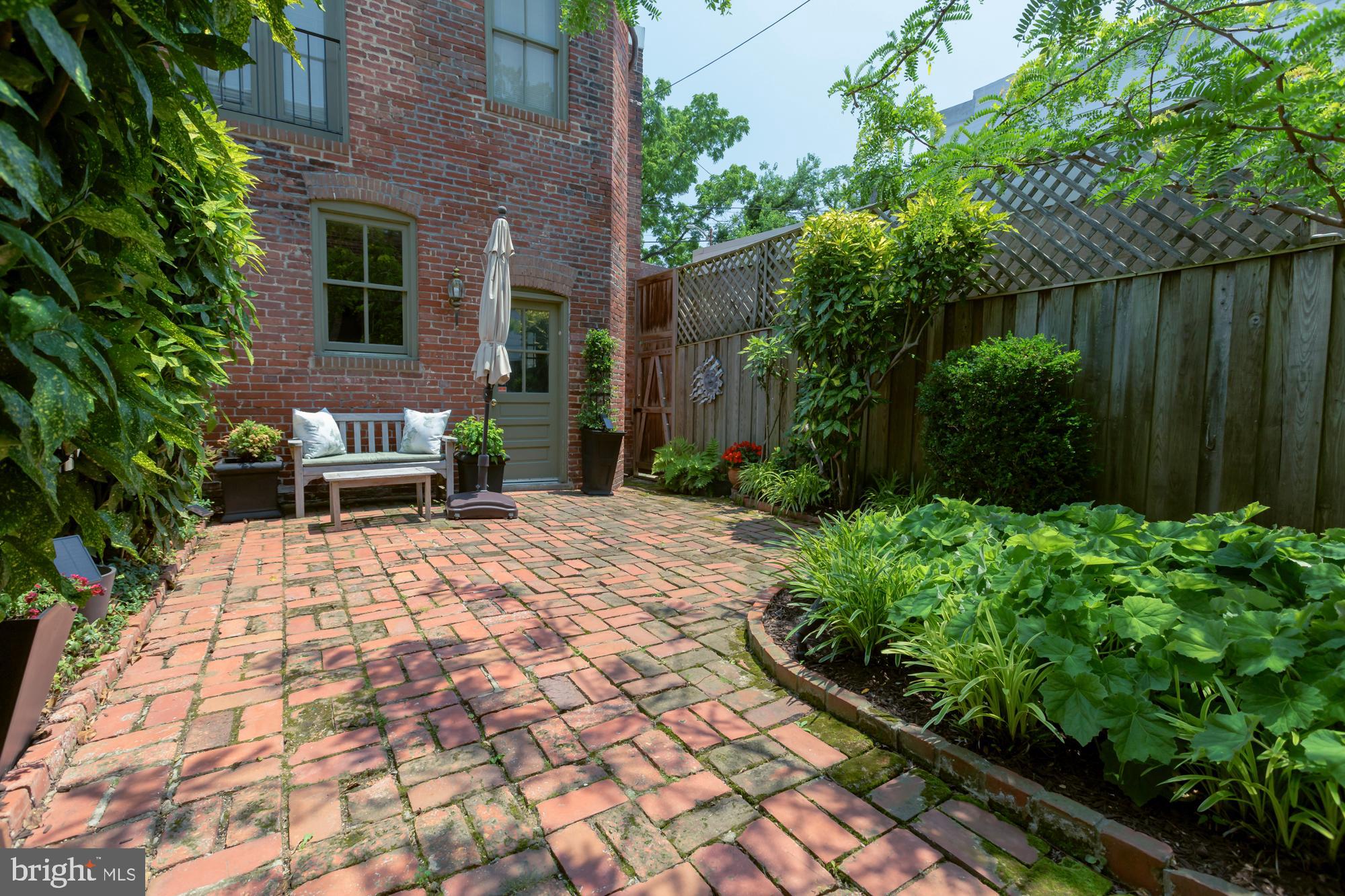 244 8th Street Southeast Washington, DC 20003 - Photo 21 of 53 a view of a backyard with sitting area