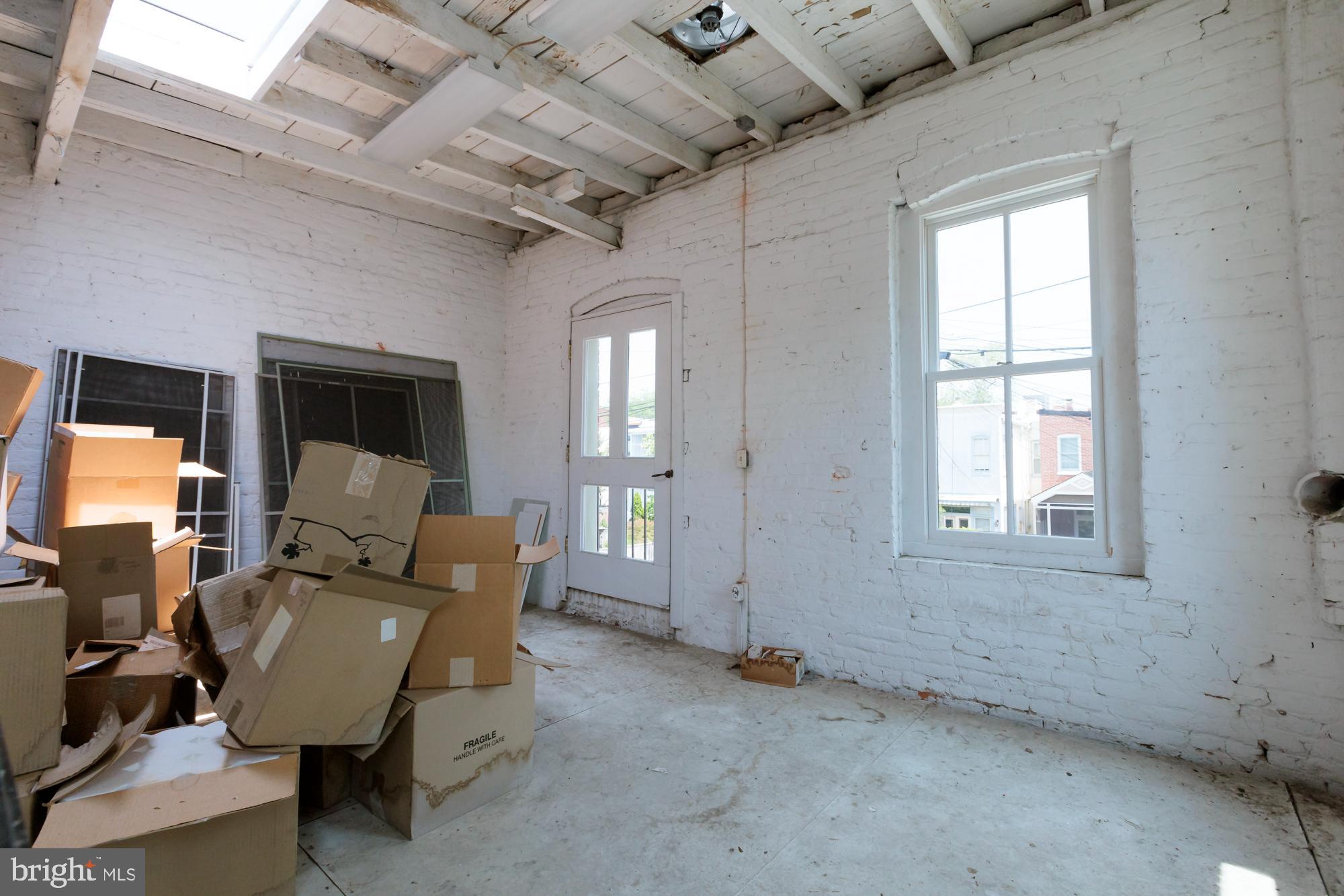 244 8th Street Southeast Washington, DC 20003 - Photo 25 of 53 a view of a livingroom with furniture and window