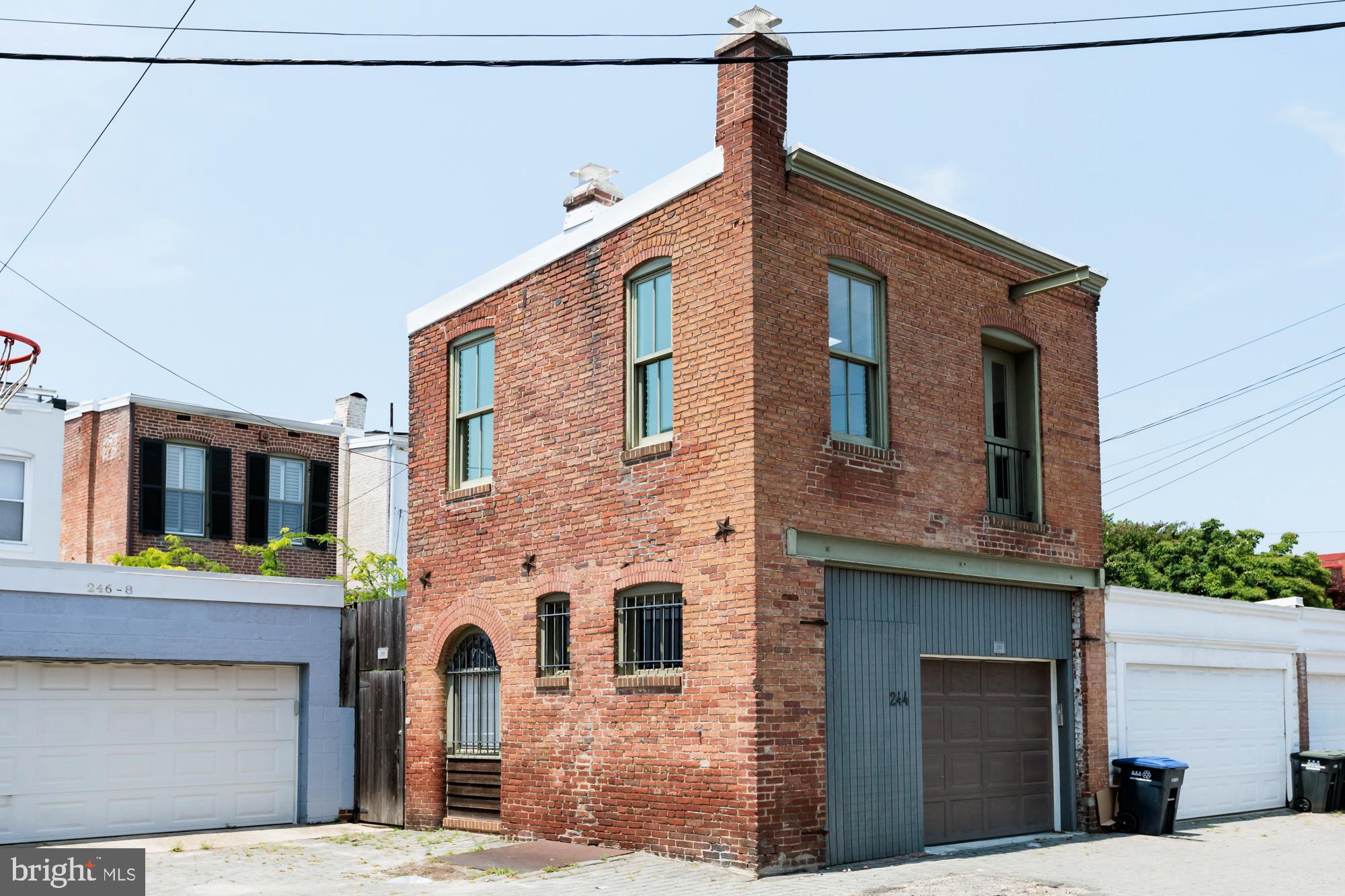 244 8th Street Southeast Washington, DC 20003 - Photo 26 of 53 a front view of a house with a garage