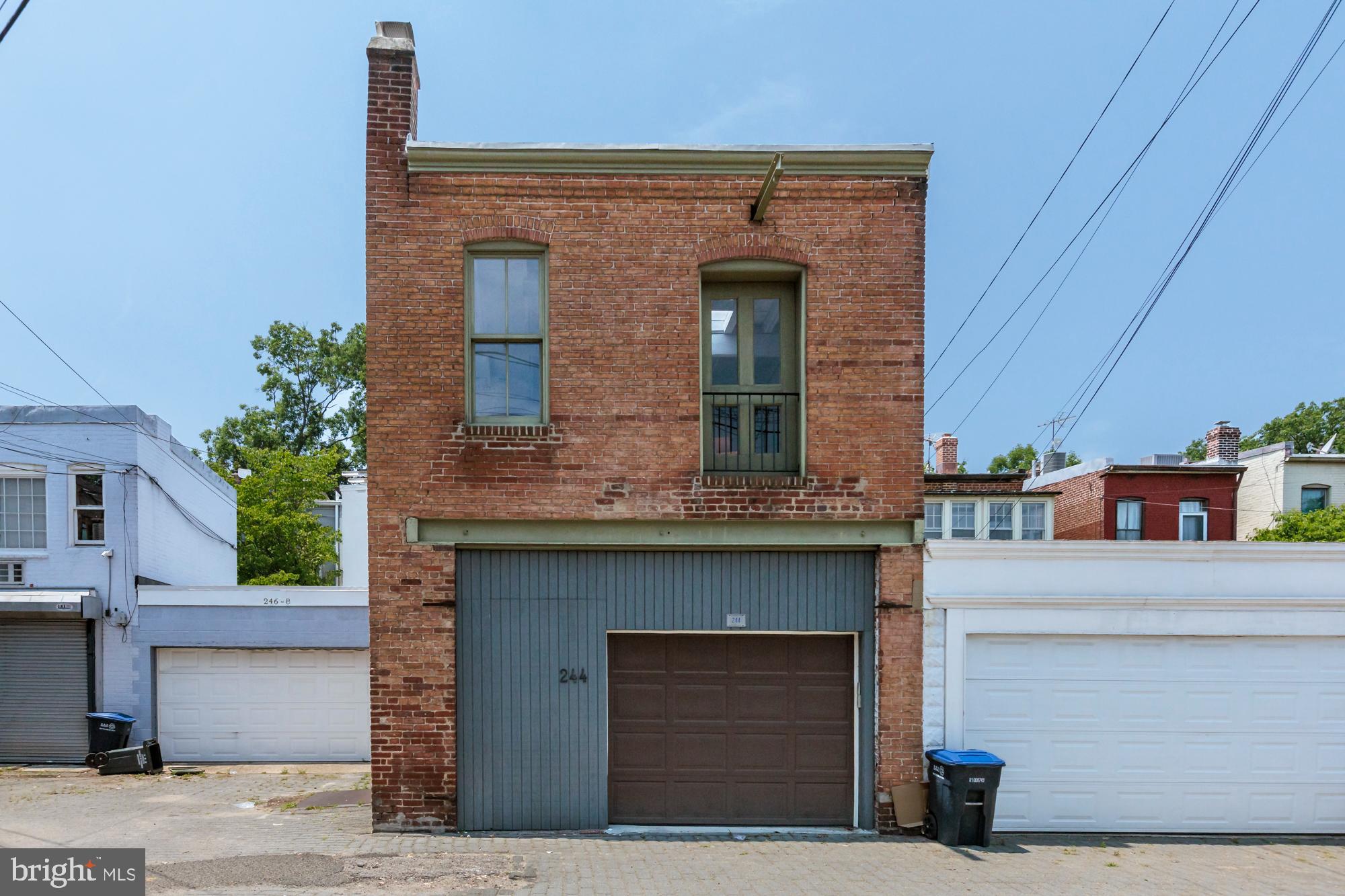 244 8th Street Southeast Washington, DC 20003 - Photo 27 of 53 a front view of a house with garage