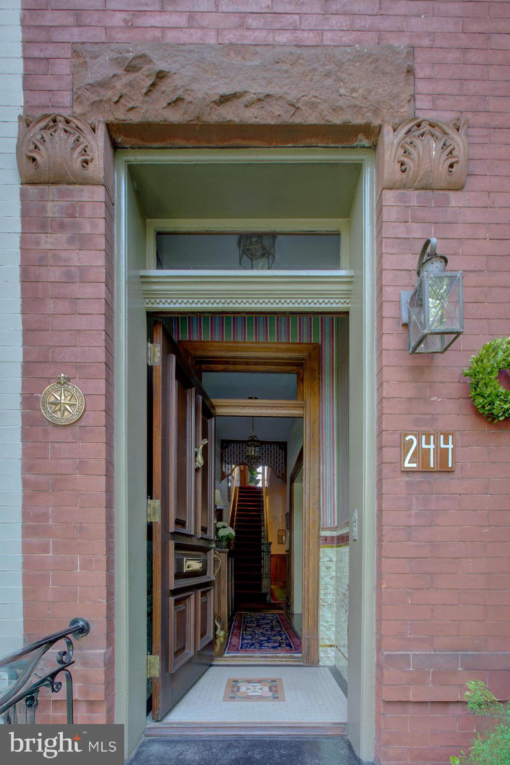 244 8th Street Southeast Washington, DC 20003 - Photo 3 of 53 a front view of a fireplace with wooden floor