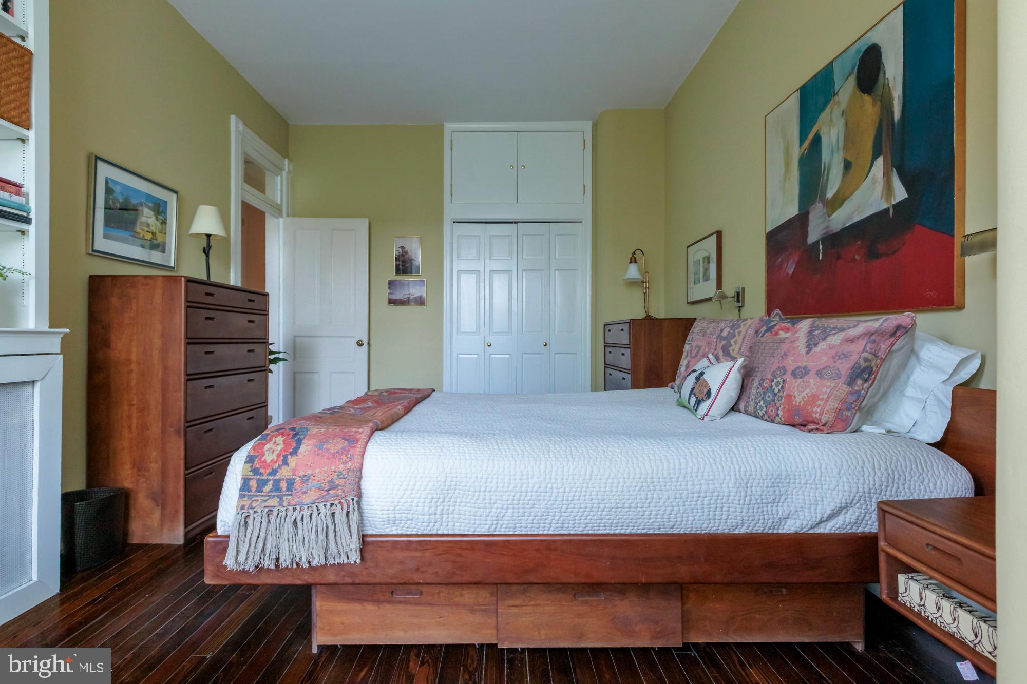 244 8th Street Southeast Washington, DC 20003 - Photo 39 of 53 a bedroom with a bed and dresser