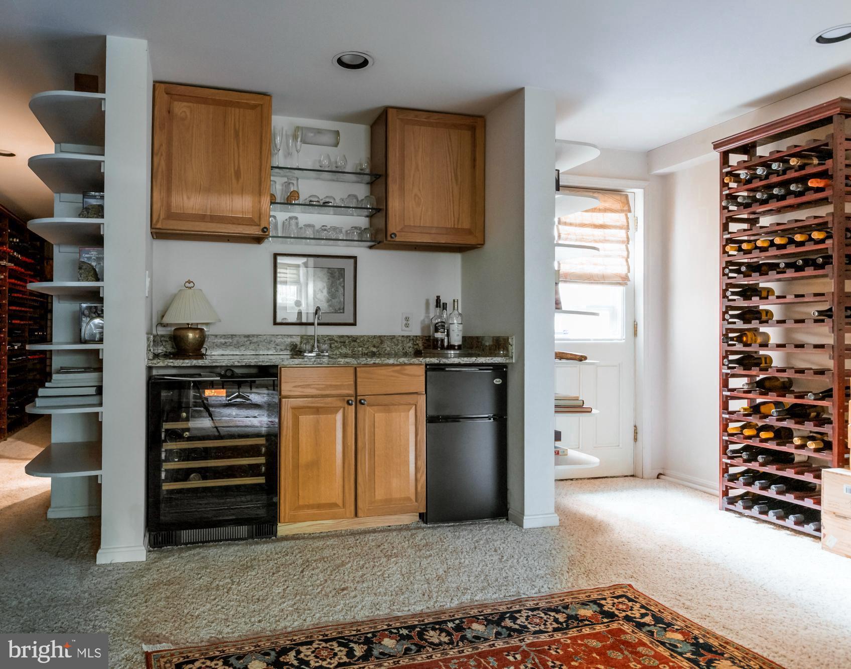 244 8th Street Southeast Washington, DC 20003 - Photo 45 of 53 a kitchen with a refrigerator and cabinets