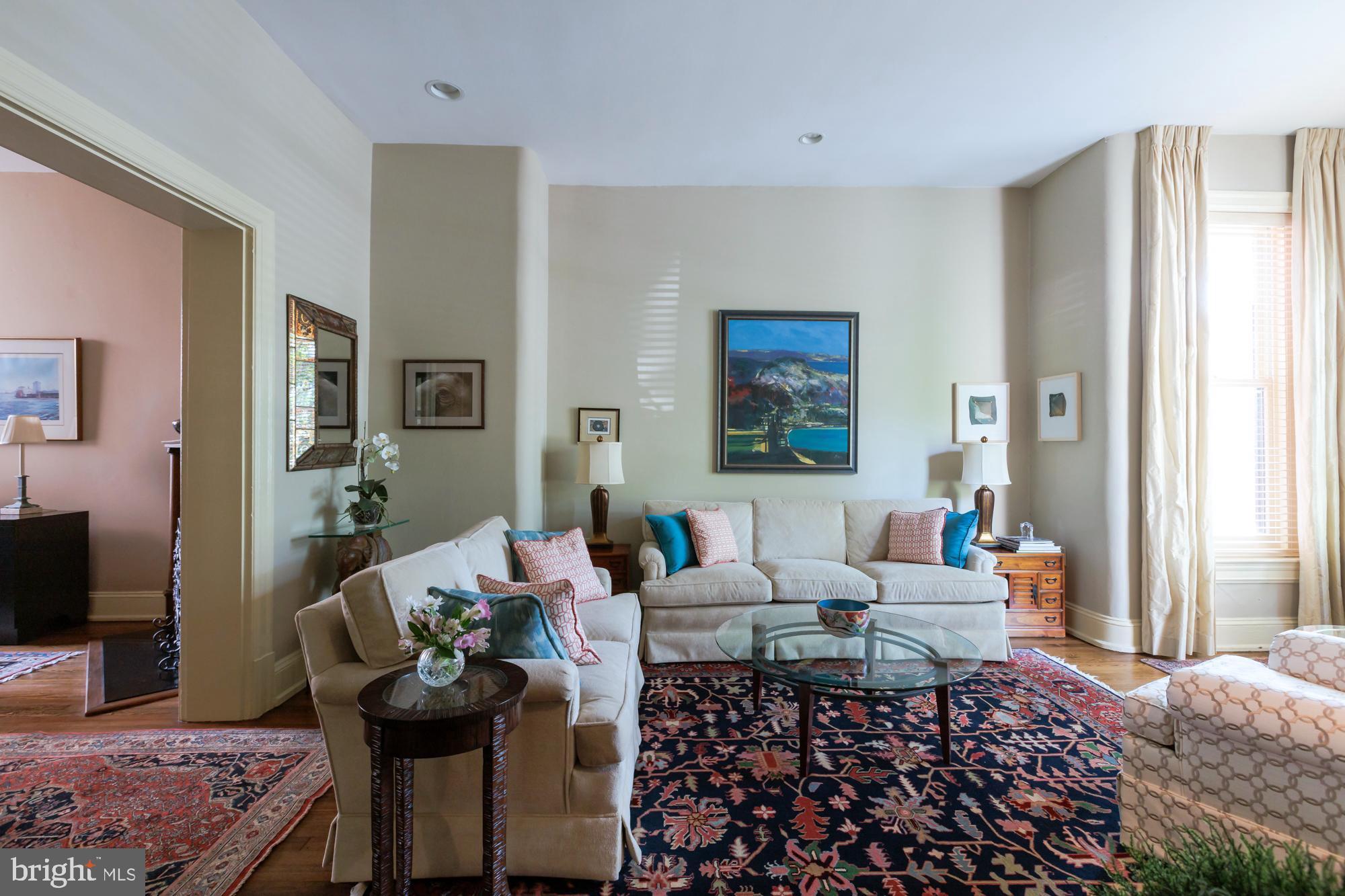 244 8th Street Southeast Washington, DC 20003 - Photo 5 of 53 a living room with furniture and a window