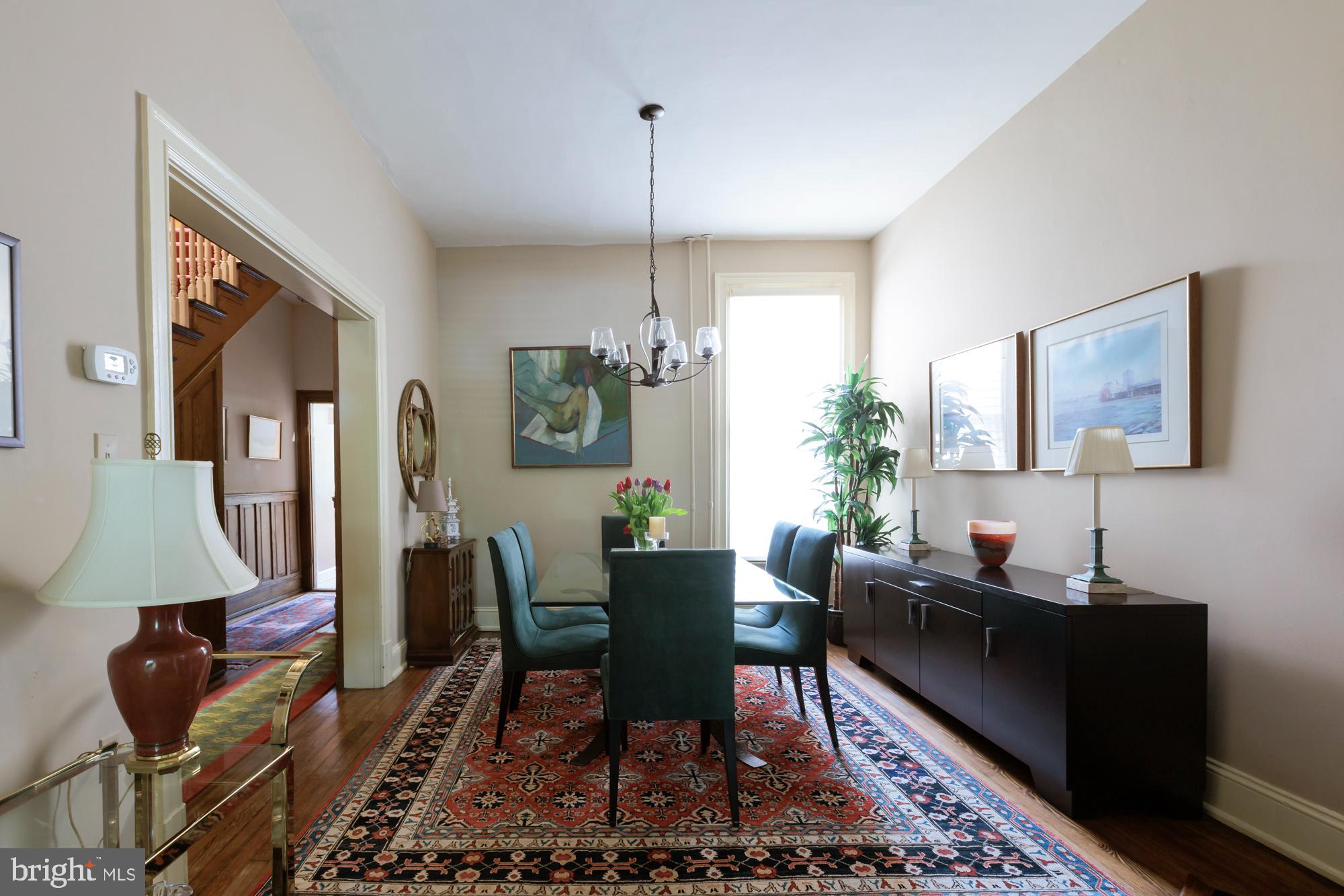 244 8th Street Southeast Washington, DC 20003 - Photo 9 of 53 a living room with furniture and a window