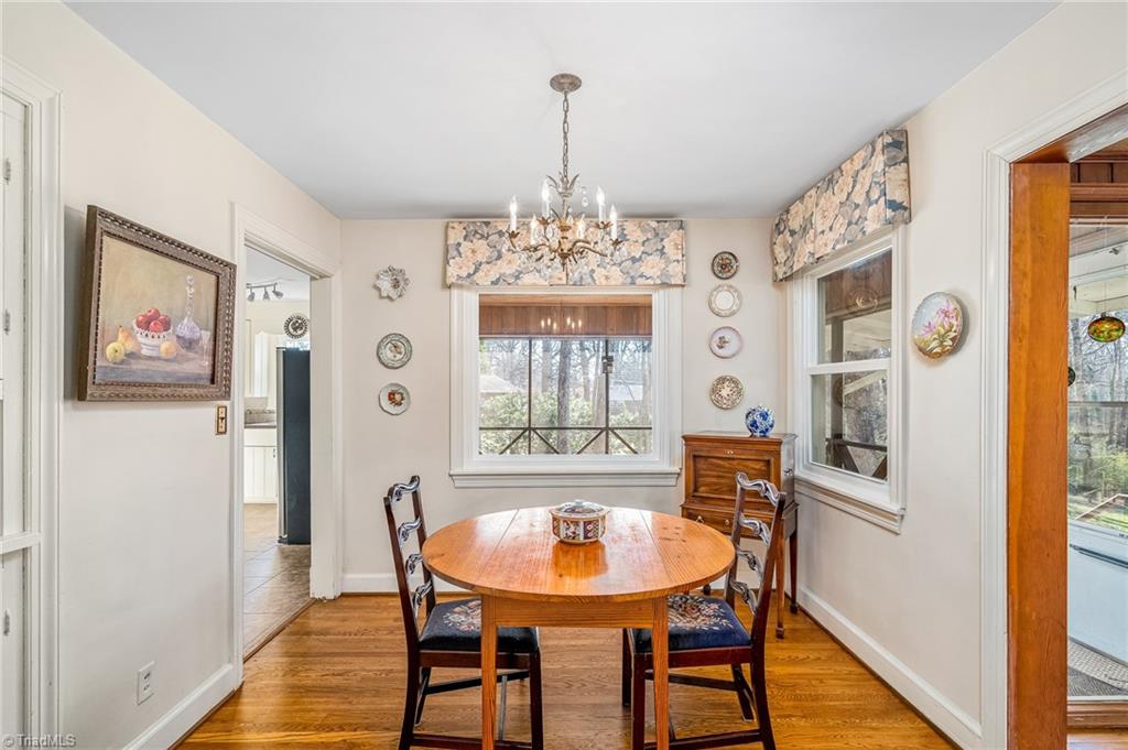 1263 Huntingdon Road Winston-Salem, NC 27104 - Photo 6 of 26 Dining room has a large window looking toward the screened porch