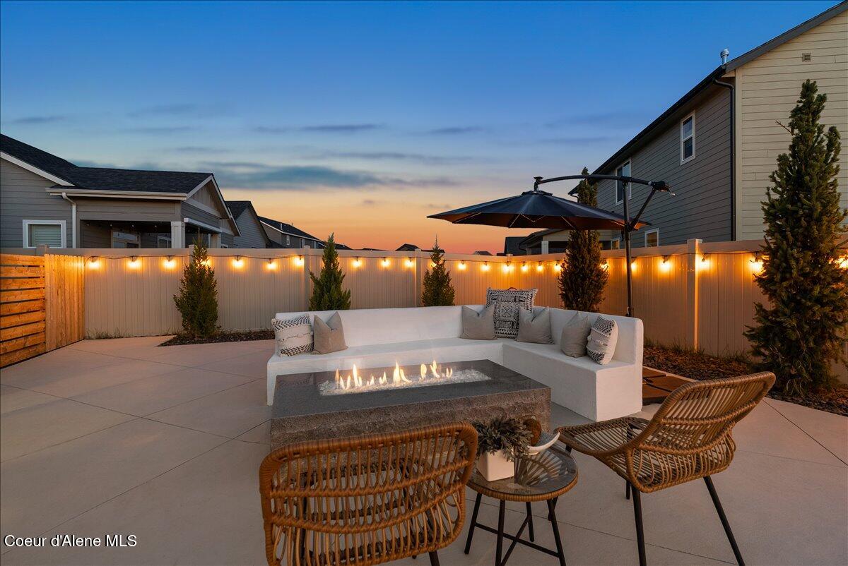 4332 West Enclave Way Coeur D'Alene, ID 83815 - Photo 18 of 52 2-Back yard fire table twilight