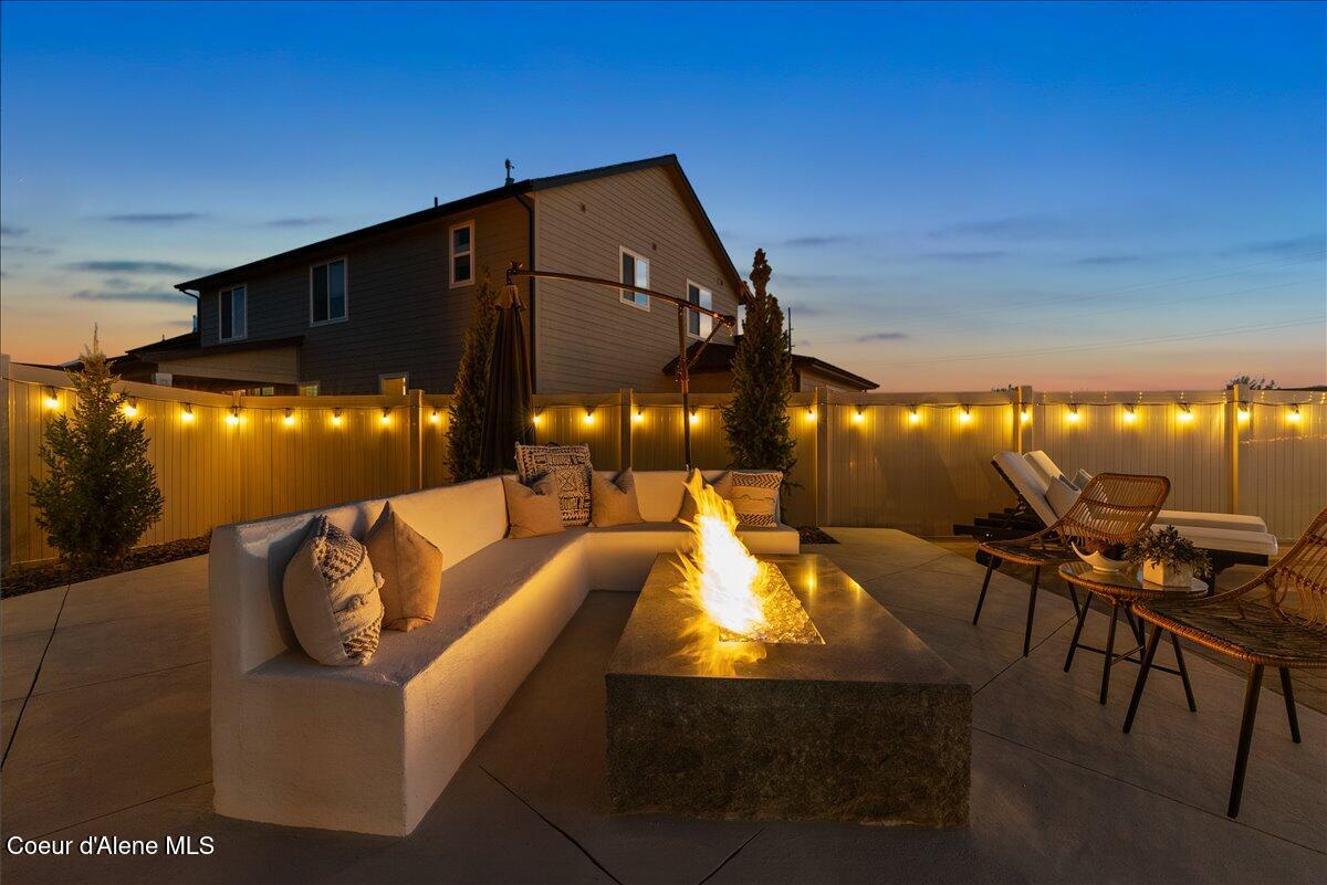 4332 West Enclave Way Coeur D'Alene, ID 83815 - Photo 19 of 52 3-Backyard firetable twilight
