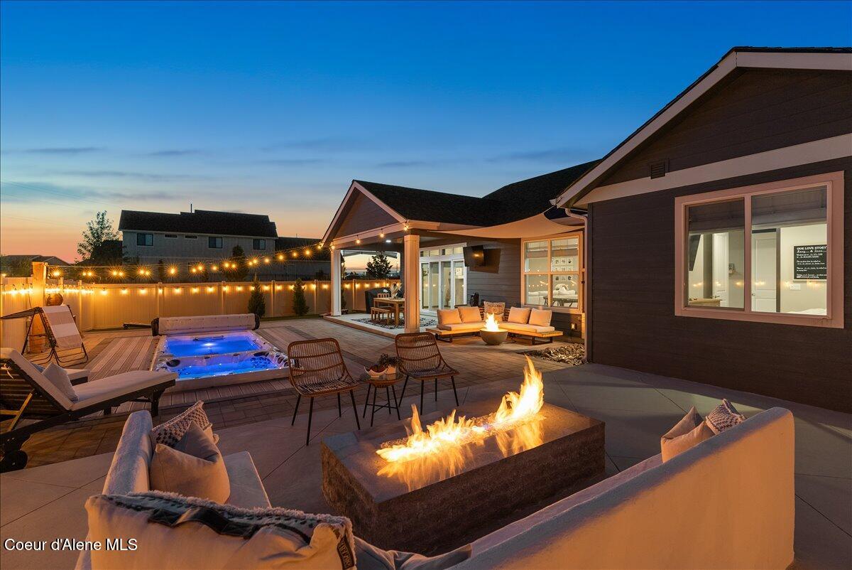 4332 West Enclave Way Coeur D'Alene, ID 83815 - Photo 3 of 52 5-Backyard and pool twilight