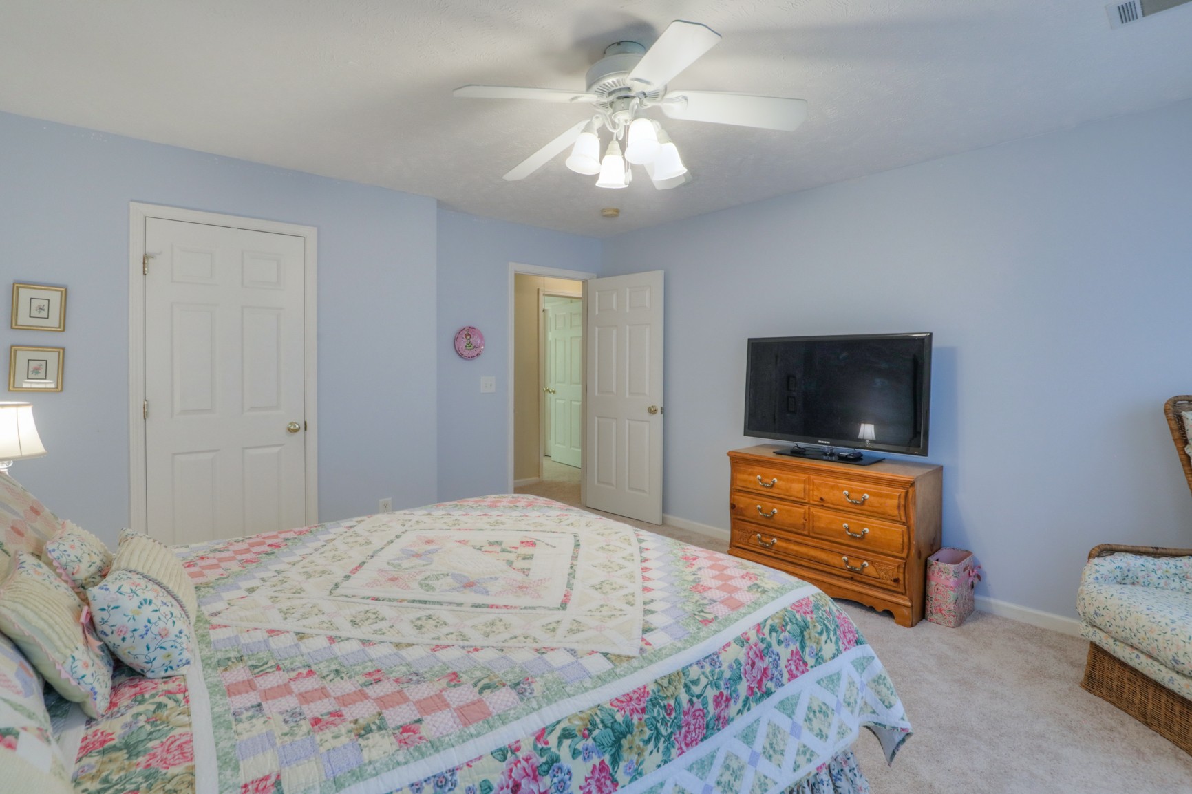 4166 Turnberry Road Lebanon, TN 37090 - Photo 18 of 25 a bedroom with a bed and a flat screen tv