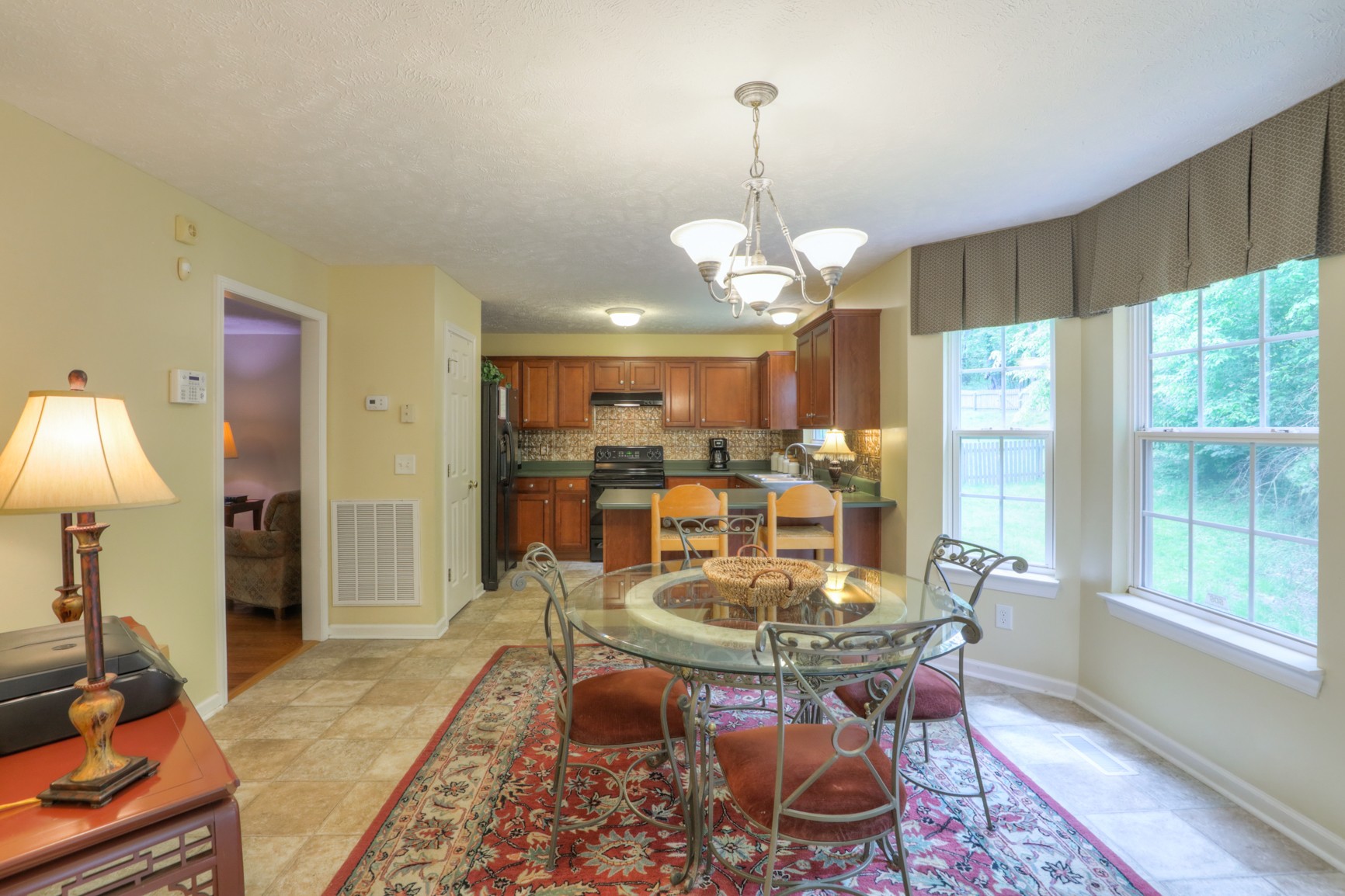 4166 Turnberry Road Lebanon, TN 37090 - Photo 8 of 25 a view of a dining room with furniture a rug and wooden floor