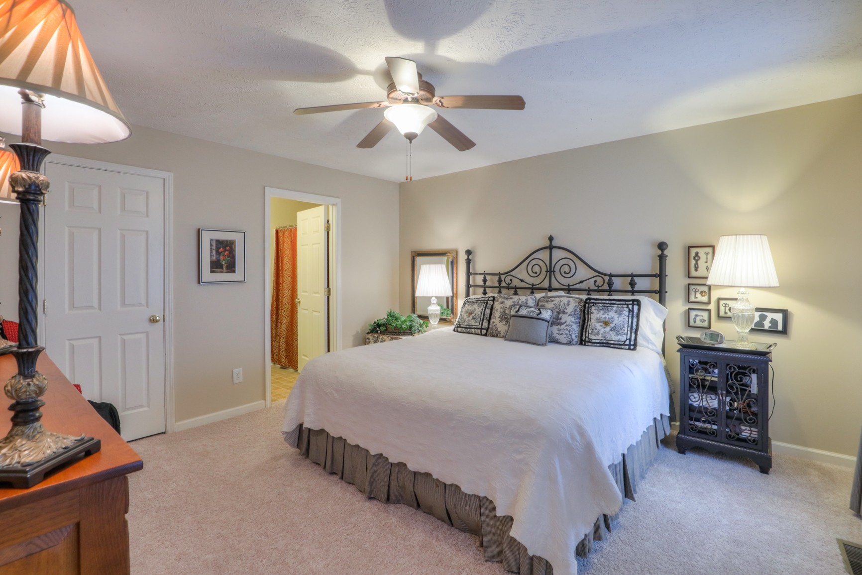 4166 Turnberry Road Lebanon, TN 37090 - Photo 9 of 25 a bedroom with a bed and a chandelier