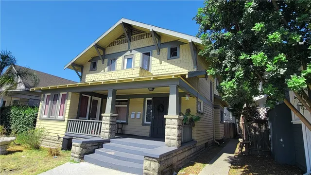 a front view of a house with yard