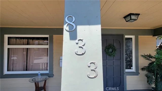 a bathroom with a shower and mirror