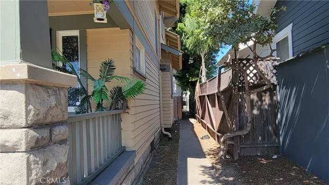 a stove top oven sitting inside of a kitchen