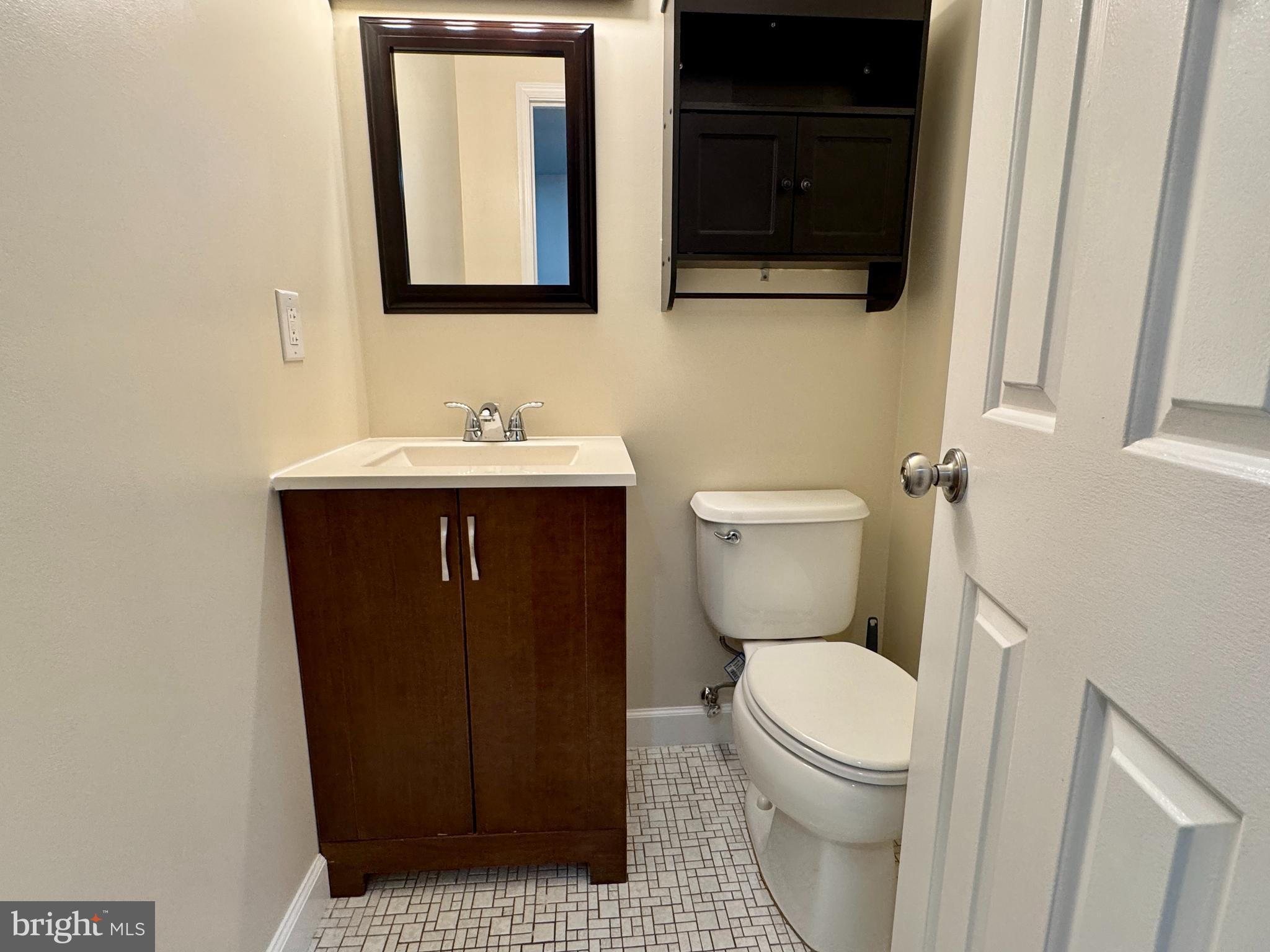 3664 Tavern Way Triangle, VA 22172 - Photo 17 of 28 a bathroom with a sink and a toilet
