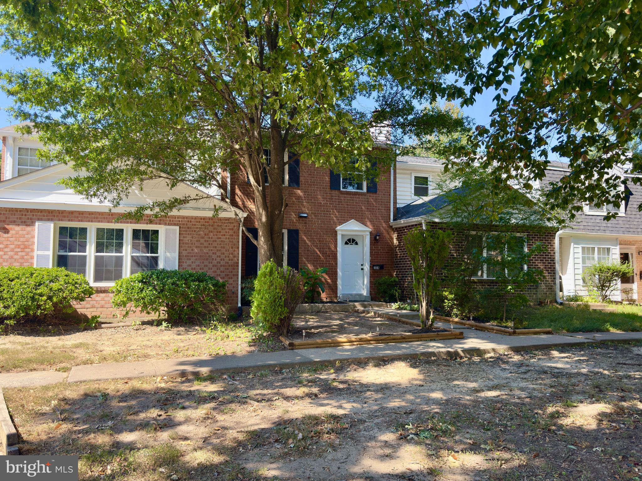 3664 Tavern Way Triangle, VA 22172 - Photo 2 of 28 a front view of a house with a yard