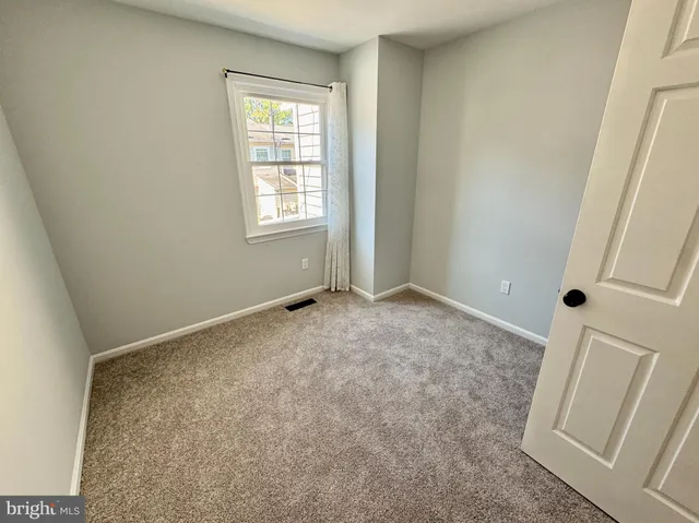 an empty room with a door