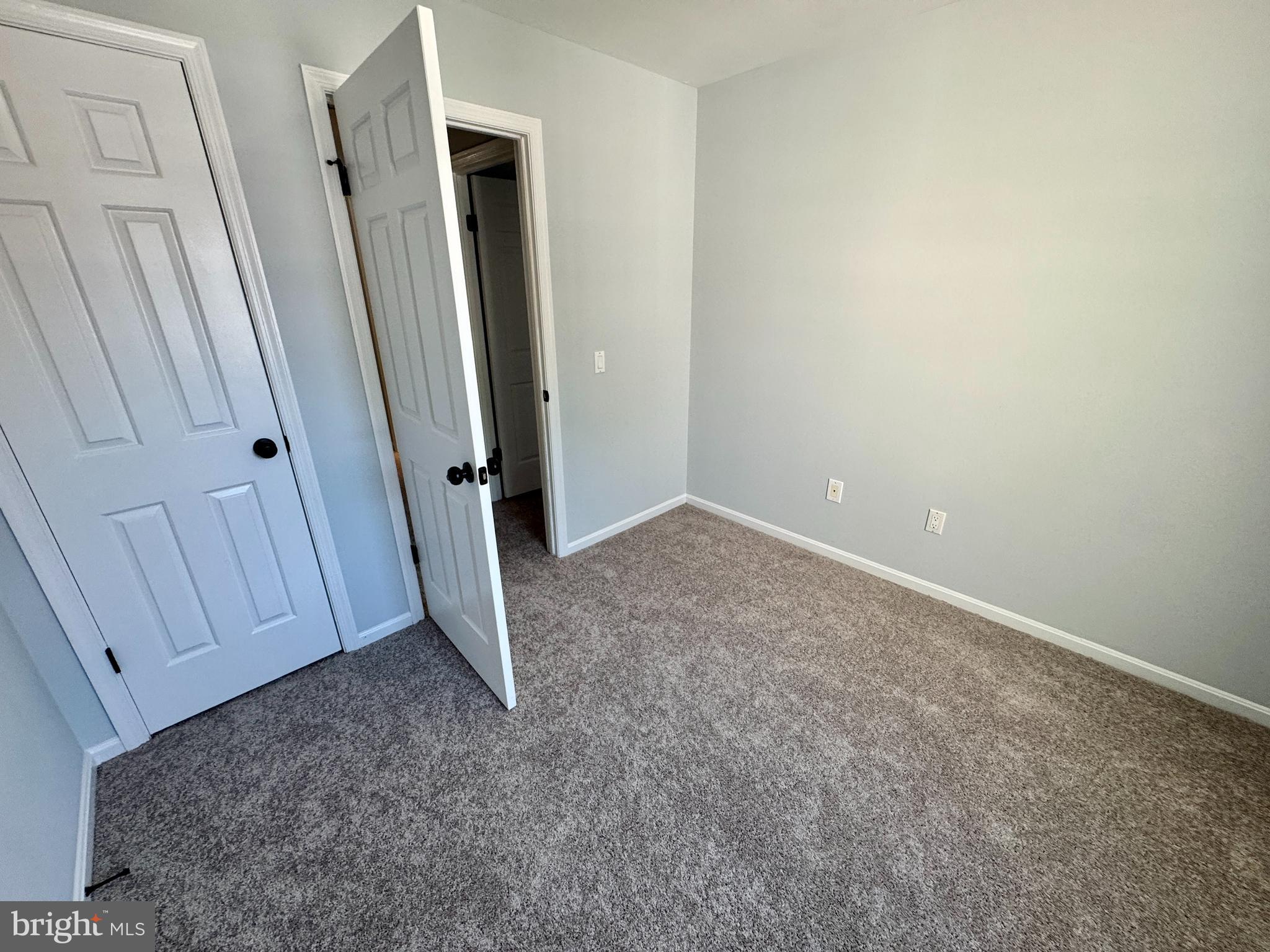 3664 Tavern Way Triangle, VA 22172 - Photo 26 of 28 an empty room with a door