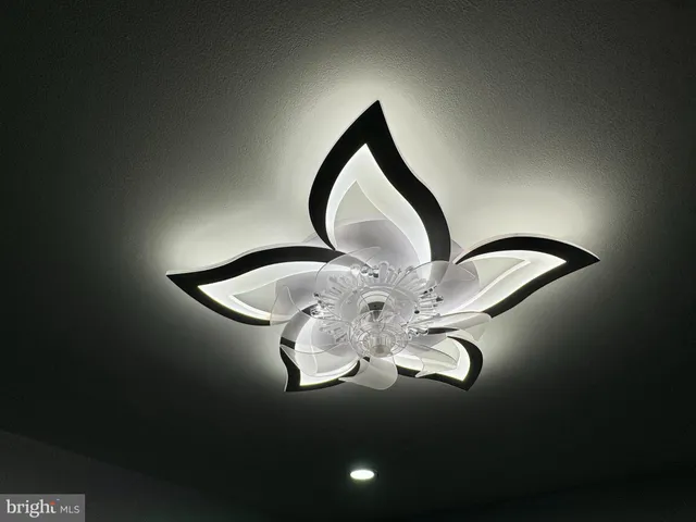 a close view of light fixtures and empty racks