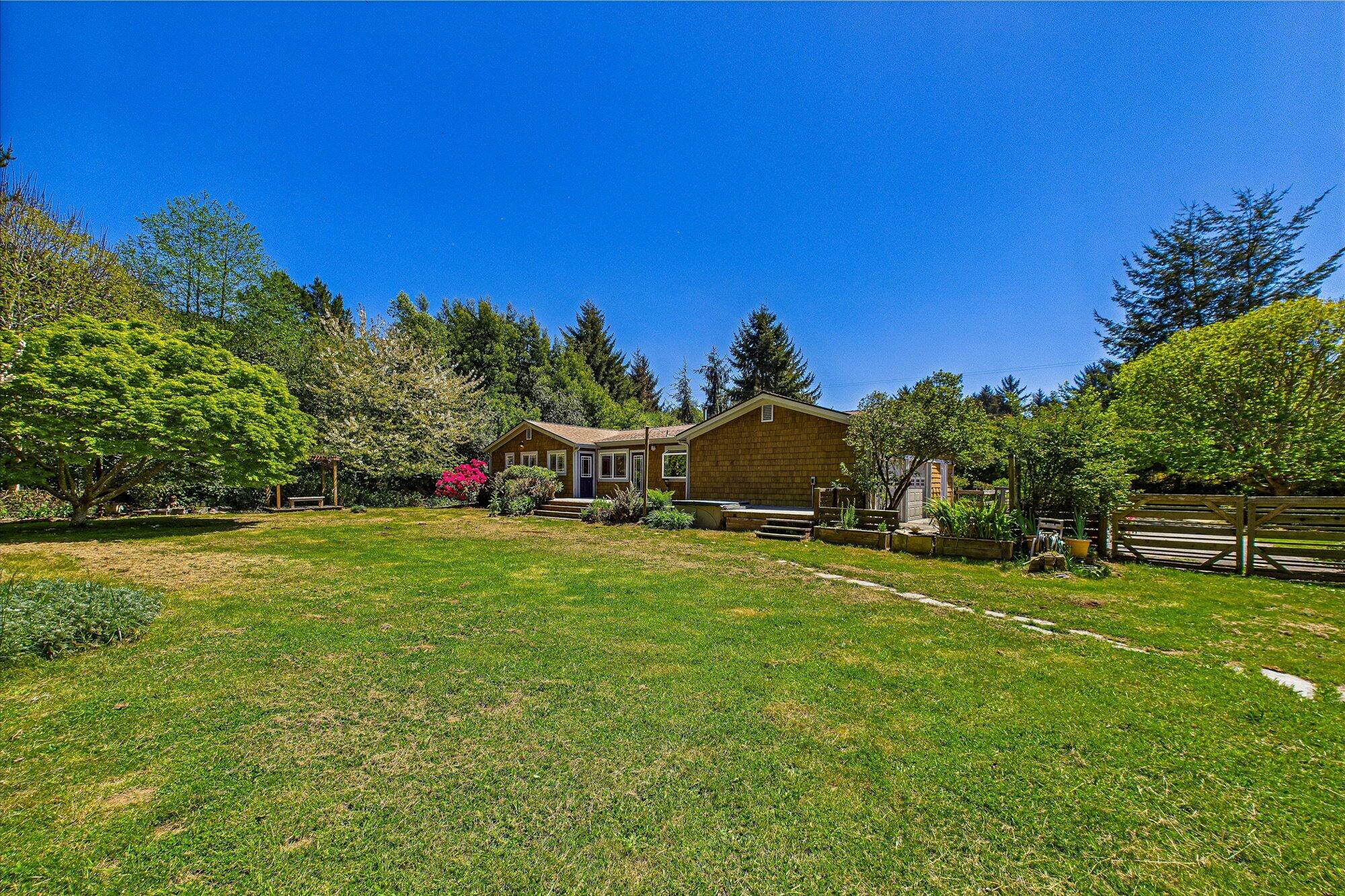 1945 Grange Road McKinleyville, CA 95519 - Photo 52 of 62 a front view of a house with a big yard