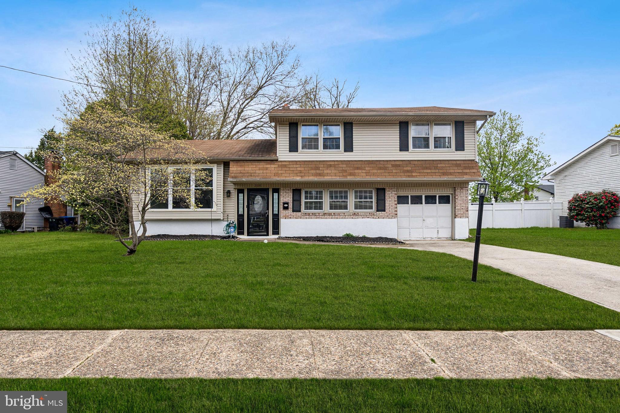 306 Colonial Road Edgewater Park, NJ 08010 - Photo 1 of 25 a view of a house with a yard