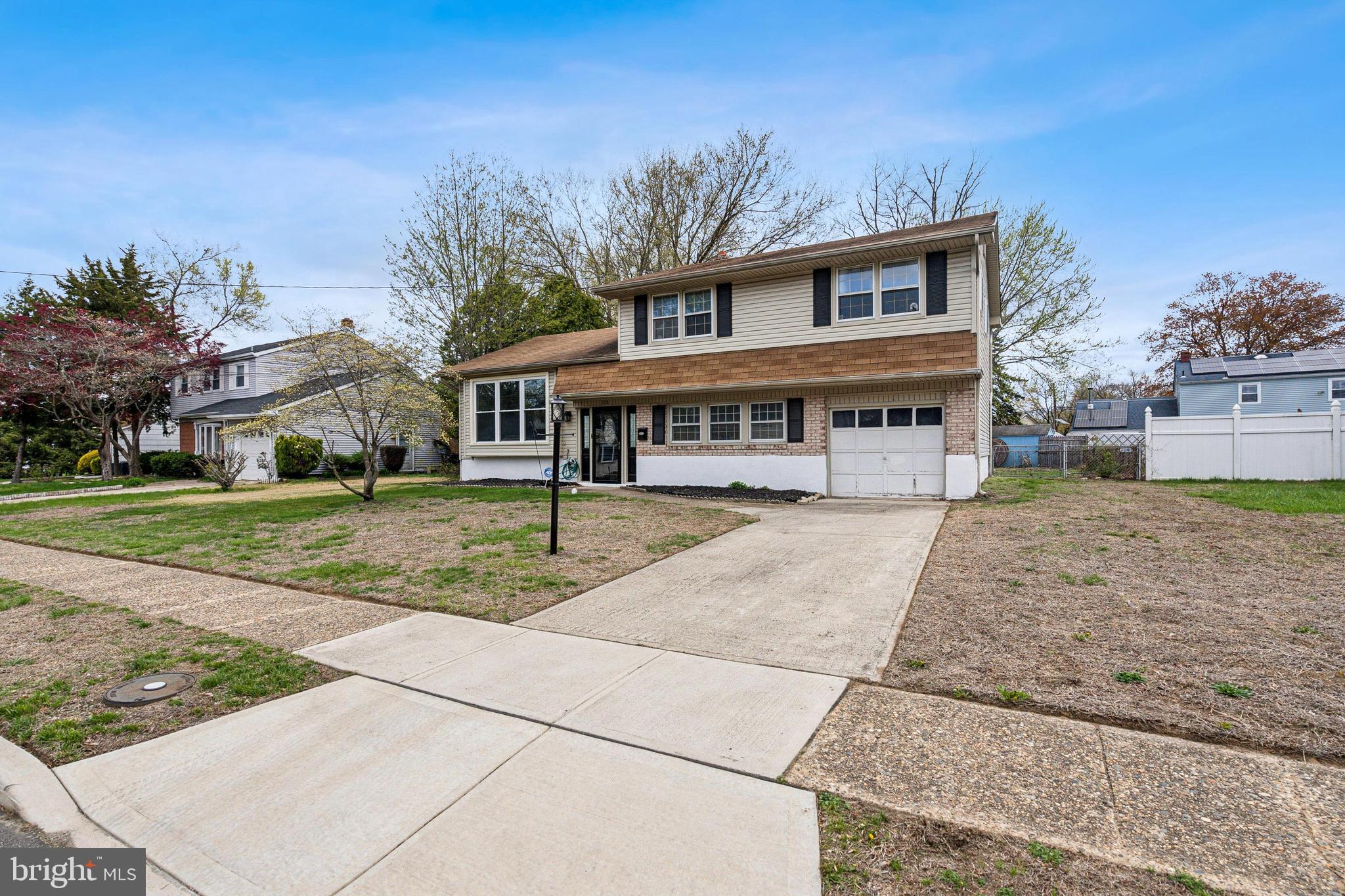 306 Colonial Road Edgewater Park, NJ 08010 - Photo 2 of 25 front view of a house with a yard