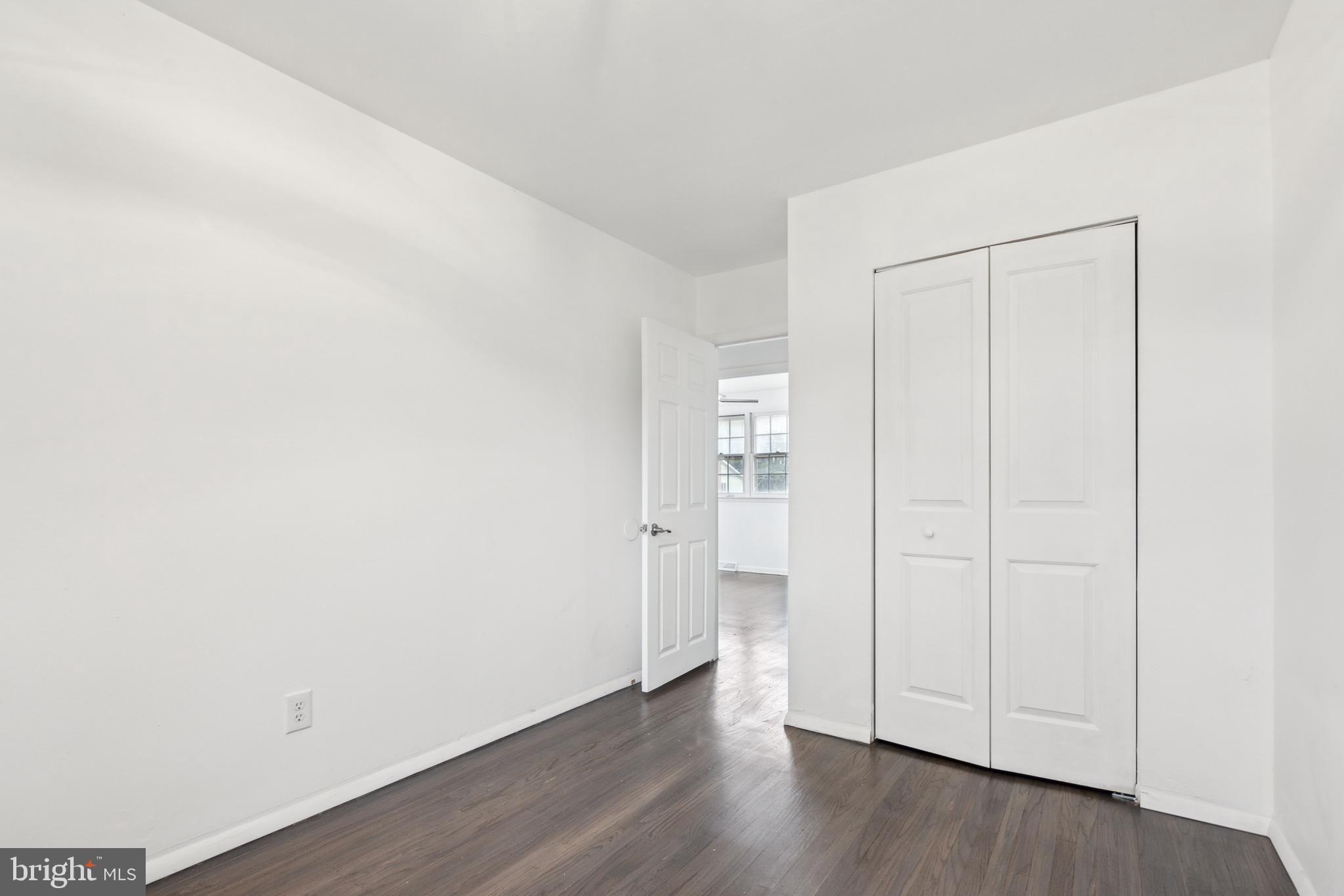 306 Colonial Road Edgewater Park, NJ 08010 - Photo 22 of 25 an empty room with wooden floor