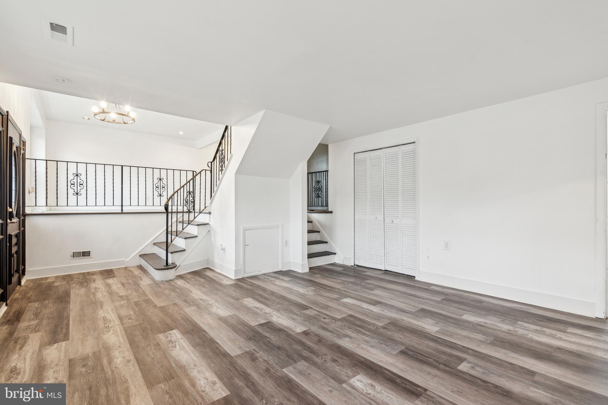 306 Colonial Road Edgewater Park, NJ 08010 - Photo 6 of 25 a view of empty room with wooden floor