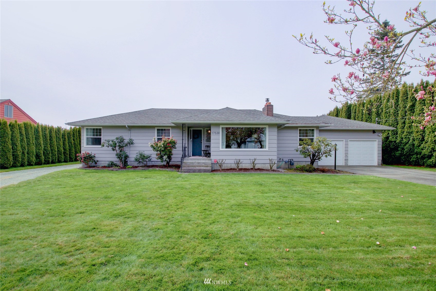 17530 Dunbar Road Mount Vernon, WA 98273 - Photo 3 of 40 a front view of a house with garden