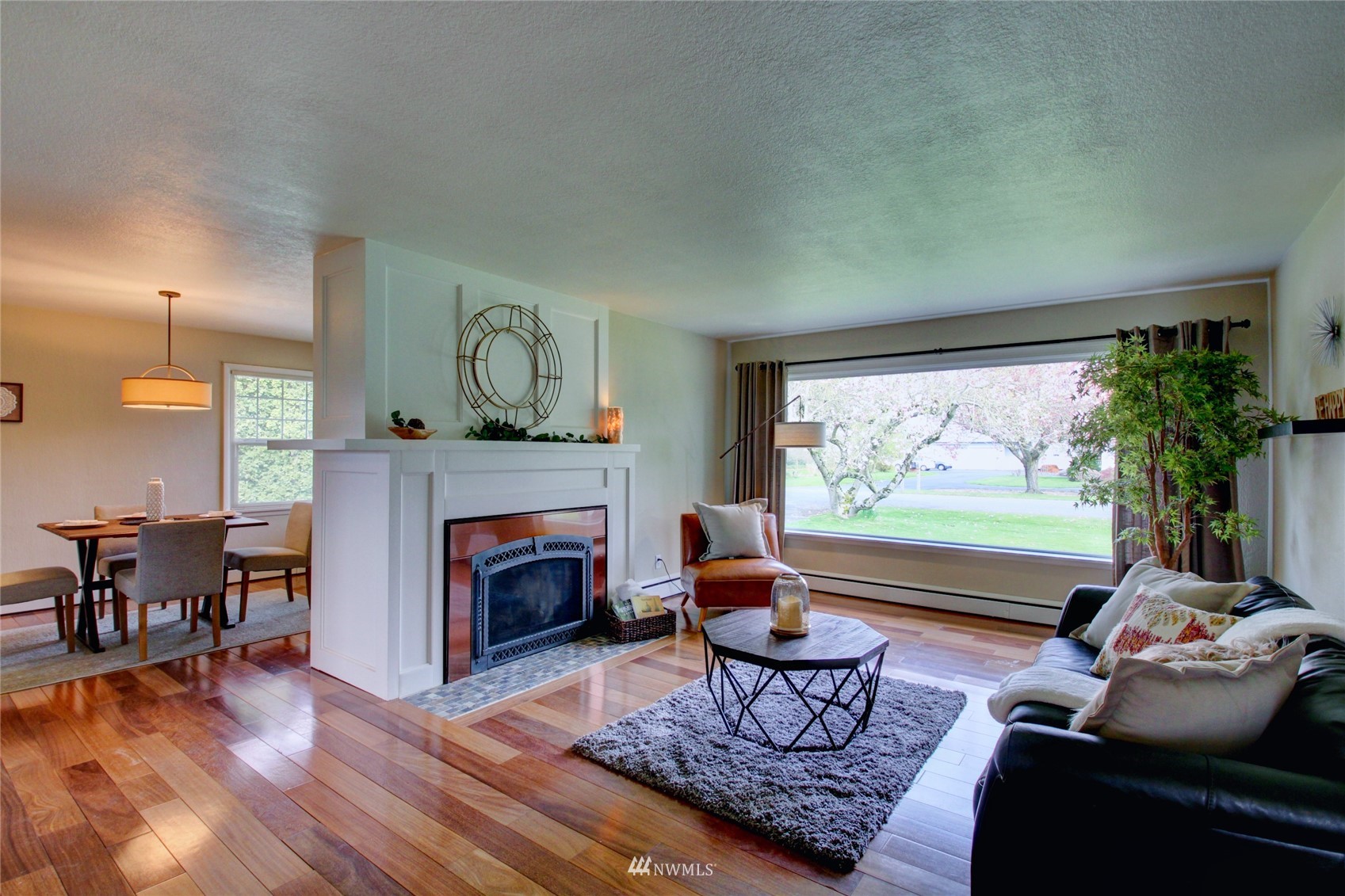 17530 Dunbar Road Mount Vernon, WA 98273 - Photo 7 of 40 a living room with furniture and a fireplace