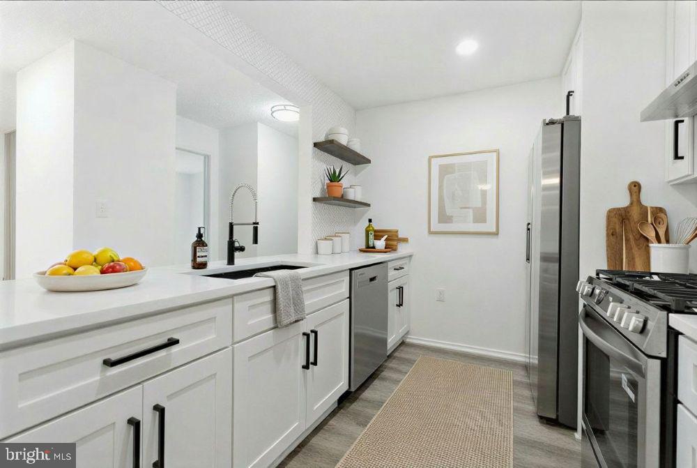 20991 Timber Ridge Terrace, Unit 101 Ashburn, VA 20147 - Photo 3 of 23 Virtually staged