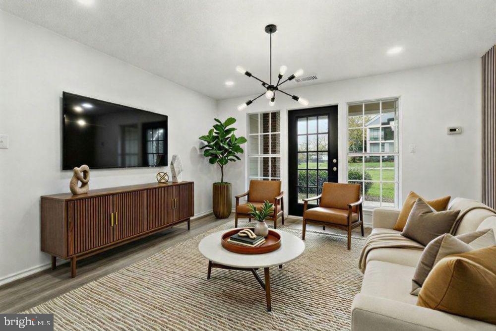 20991 Timber Ridge Terrace, Unit 101 Ashburn, VA 20147 - Photo 7 of 23 Virtually staged