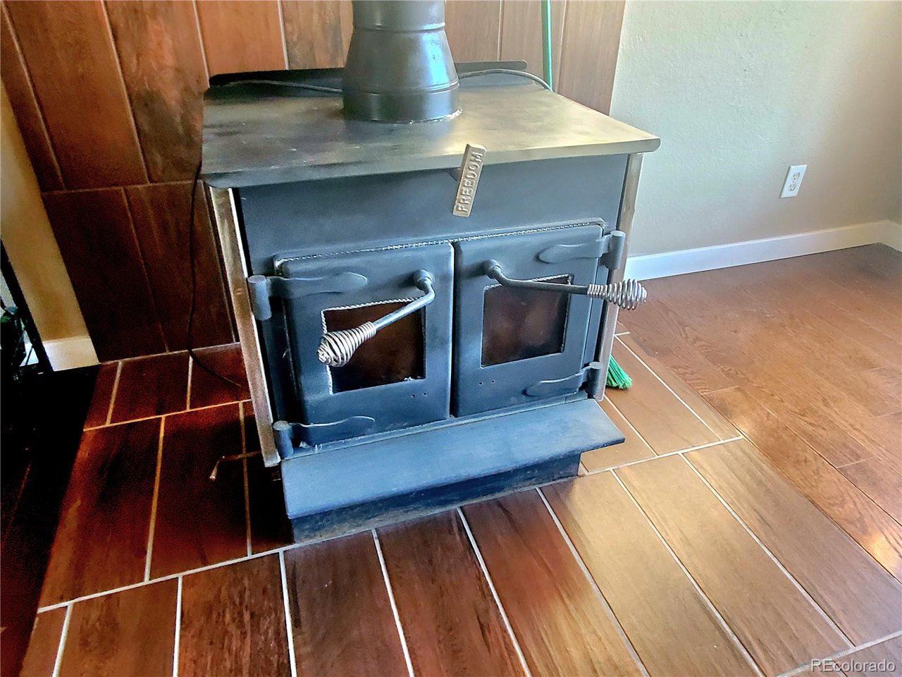 5339 County Road 19 Florence, CO 81226 - Photo 13 of 50 freedom woodburning stove for keeping your home toasty