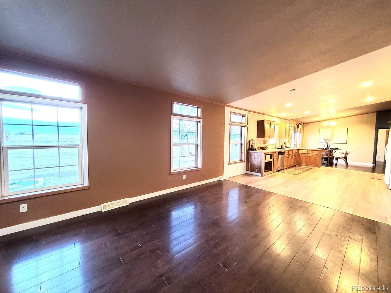 5339 County Road 19 Florence, CO 81226 - Photo 23 of 50 Family room looking towards kitchcen and dingin room, open lilving at its best