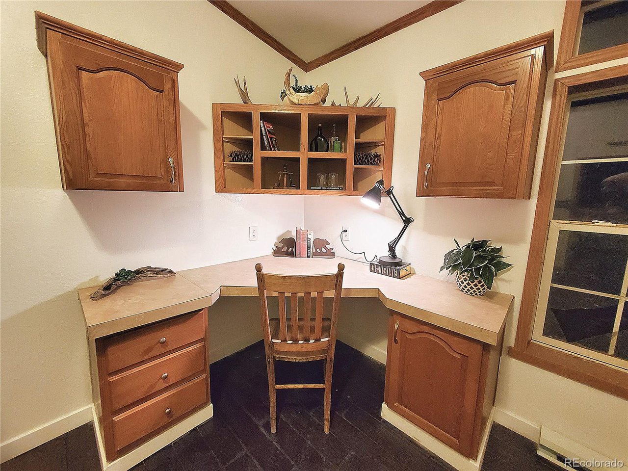 5339 County Road 19 Florence, CO 81226 - Photo 26 of 50 close up of office built in desk, bookshelves & cabinetry