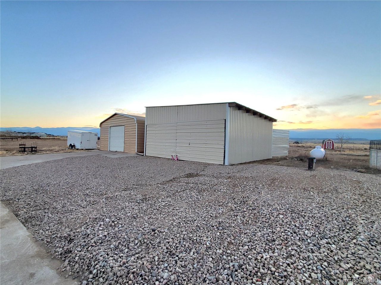 5339 County Road 19 Florence, CO 81226 - Photo 42 of 50 Tandem garage/worksop with lights, heat, storage on the left, pull through garage on the right