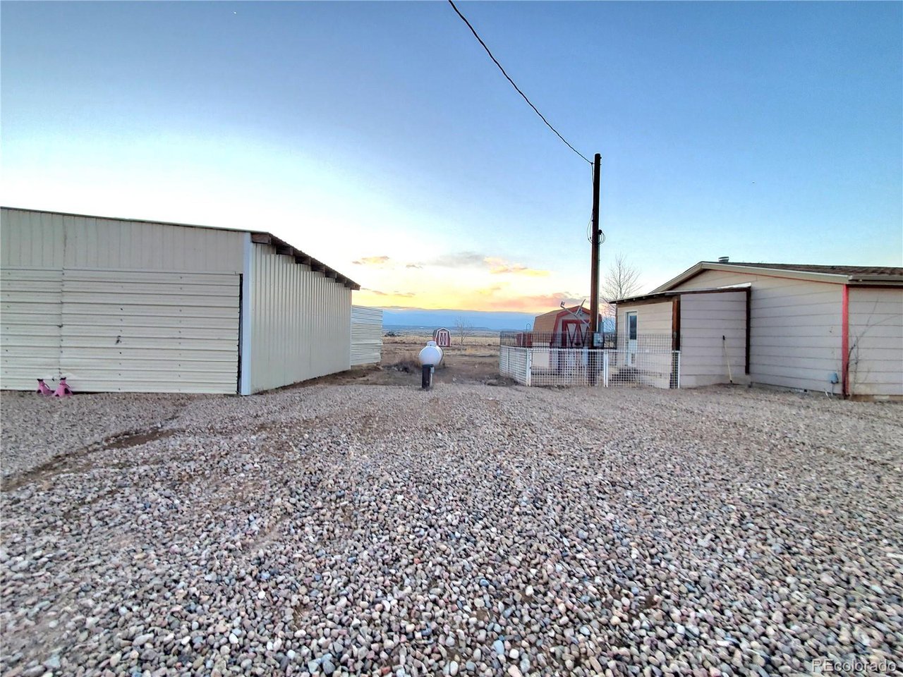 5339 County Road 19 Florence, CO 81226 - Photo 43 of 50 Pull through garage on left, home on right