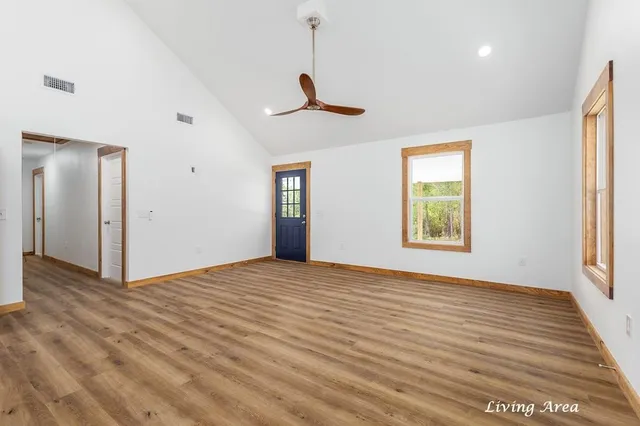 a view of an empty room with a window