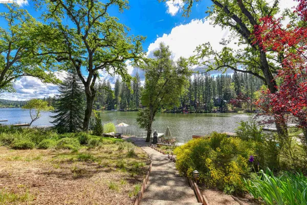 a lake view with a house