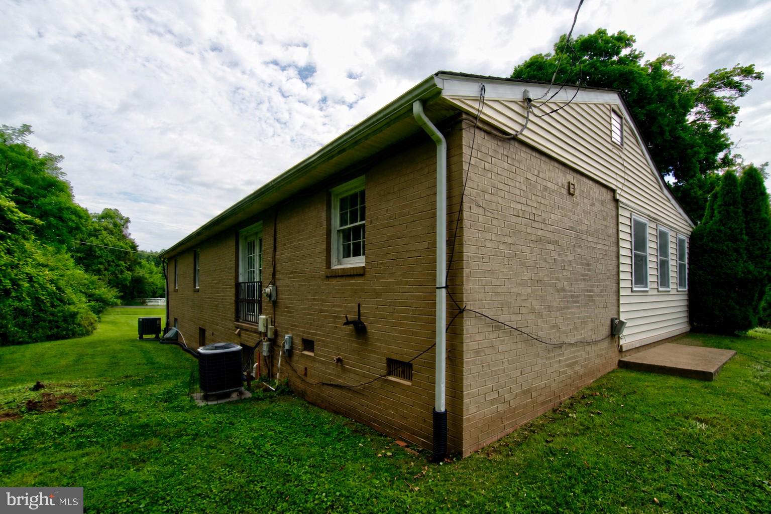 900 Walker Road Great Falls, VA 22066 - Photo 46 of 52 Charming home with lush green surroundings.