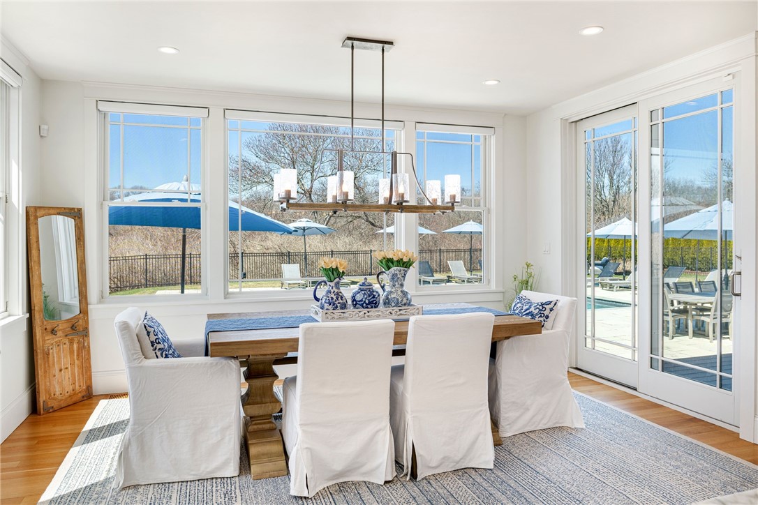 1048 Ocean Road Narragansett, RI 02882 - Photo 18 of 50 Dining area overlooking the glistening pool