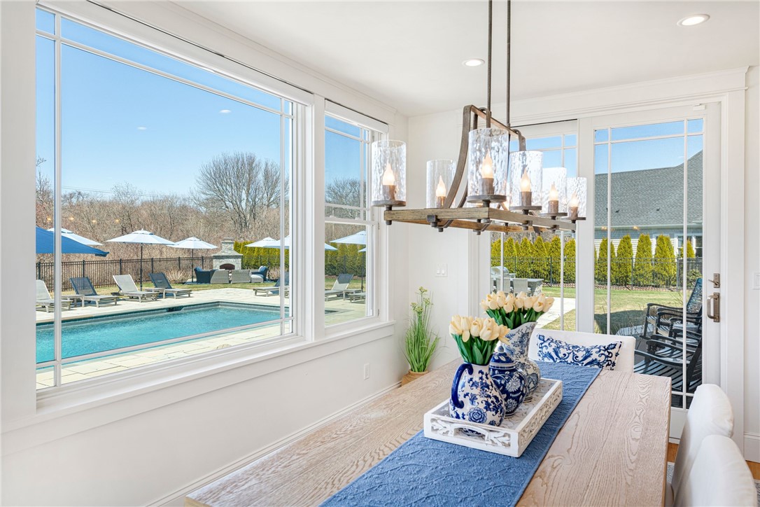 1048 Ocean Road Narragansett, RI 02882 - Photo 19 of 50 Sliders from living room & dining area to patio and pool